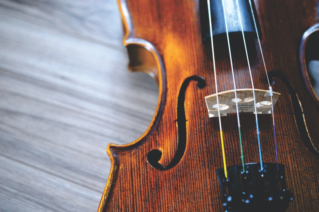 A close-up shot of a violin in all its intricate details.