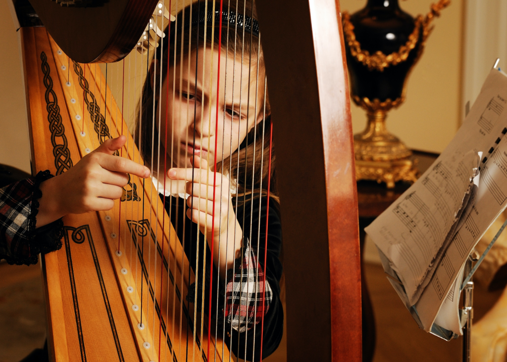 A harp, evoking the instrument's angelic charm.