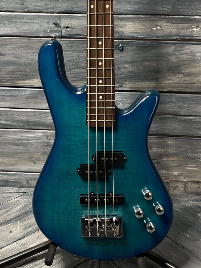 A blue bass guitar