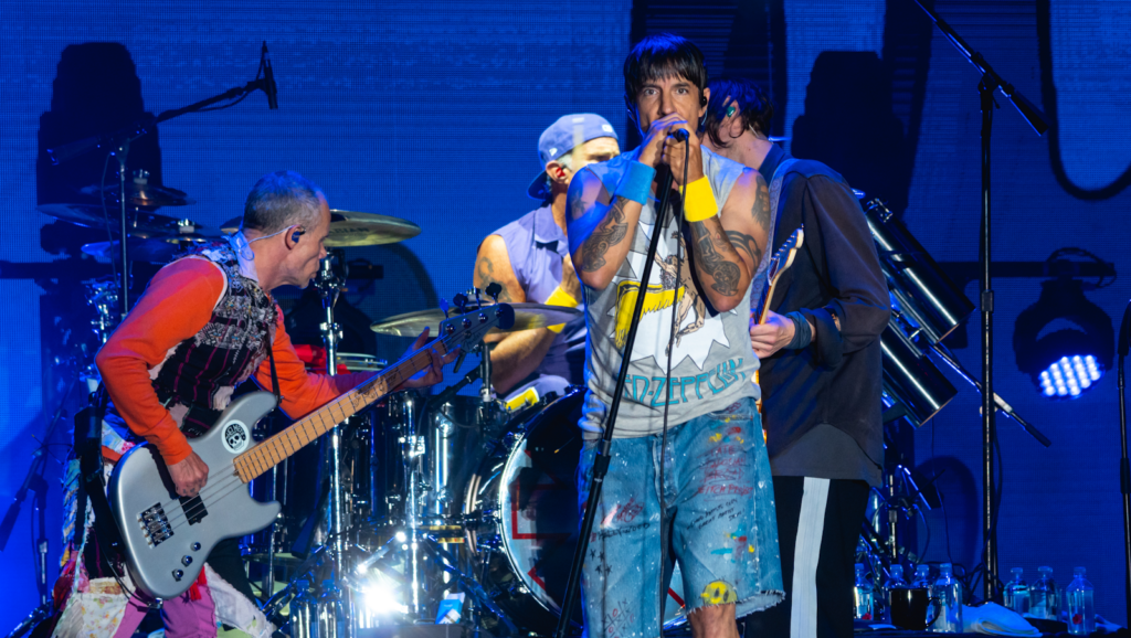 Red Hot Chili Peppers performing on stage.