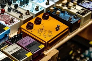 A selection of guitar pedals arranged next to each other.