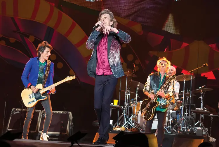The Rolling Stones performing on stage.