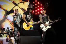 Guns 'n Roses performing on stage.