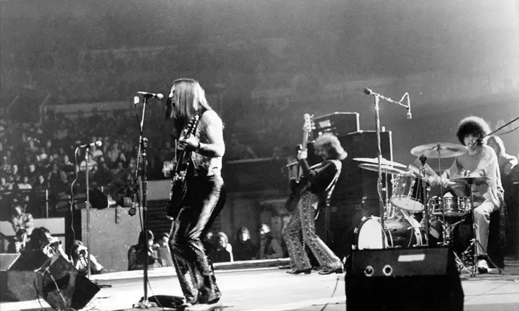 Grand Funk Railroad performing on stage.