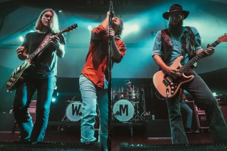 Whiskey Myers performing on stage.