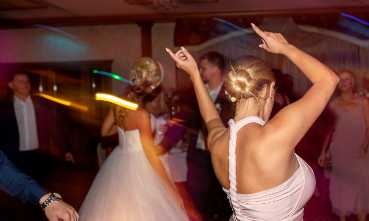 Dancing wedding guests.