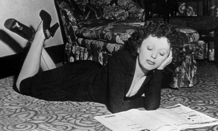 Édith Piaf relaxing at home.
